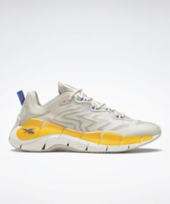 حذاء ريبوك زيج كينتكا 2 للجنسين لون بيج وأصفر - Reebok Unisex Zig Kinetica II Shoes