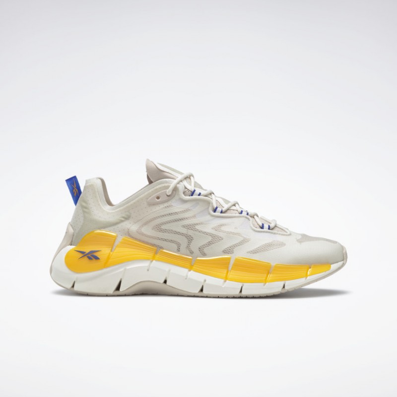 حذاء ريبوك زيج كينتكا 2 للجنسين لون بيج وأصفر - Reebok Unisex Zig Kinetica II Shoes