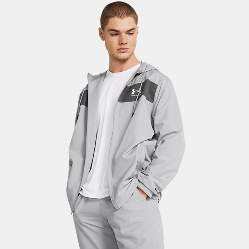 جاكيت أندر آرمر سبورت ستايل ويندبريكر ضد الماء للرجال لون رمادي فاتح- Under Armour Men's Sportstyle Windbreaker Jacket