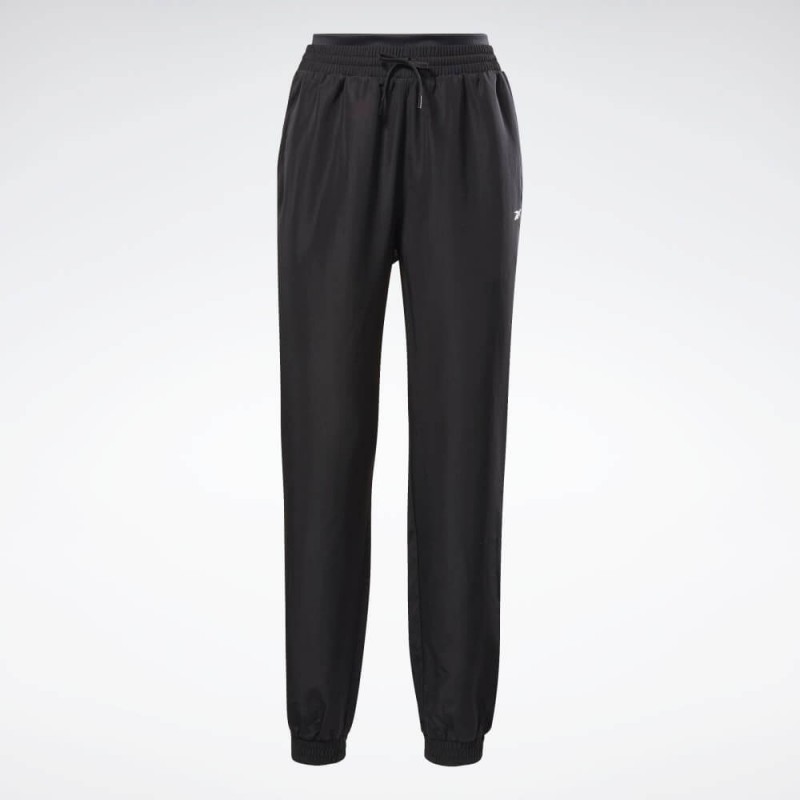 Reebok‏ Womens' Workout Ready Woven Joggers- بنطلون ريبوك وور ورك اوت ريدي للنساء لون أسود‏