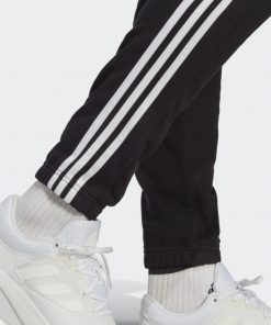 بنطلون اديداس للرجال لون اسود-adidas Men's Essentials French Terry Tapered Elastic Cuff 3-Stripes Joggers Pants
